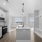 This vibrant one-bedroom shines with sleek appliances, ample counter space, and a convenient mudroom for stylish, functional living.