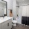 Spacious bathroom with white vanity